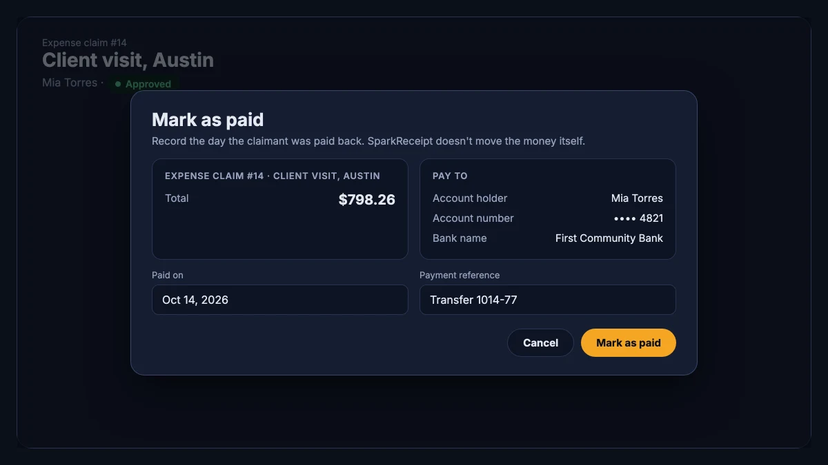 The Mark as paid dialog with the claim total, the payee's bank details, the paid-on date, and a payment reference