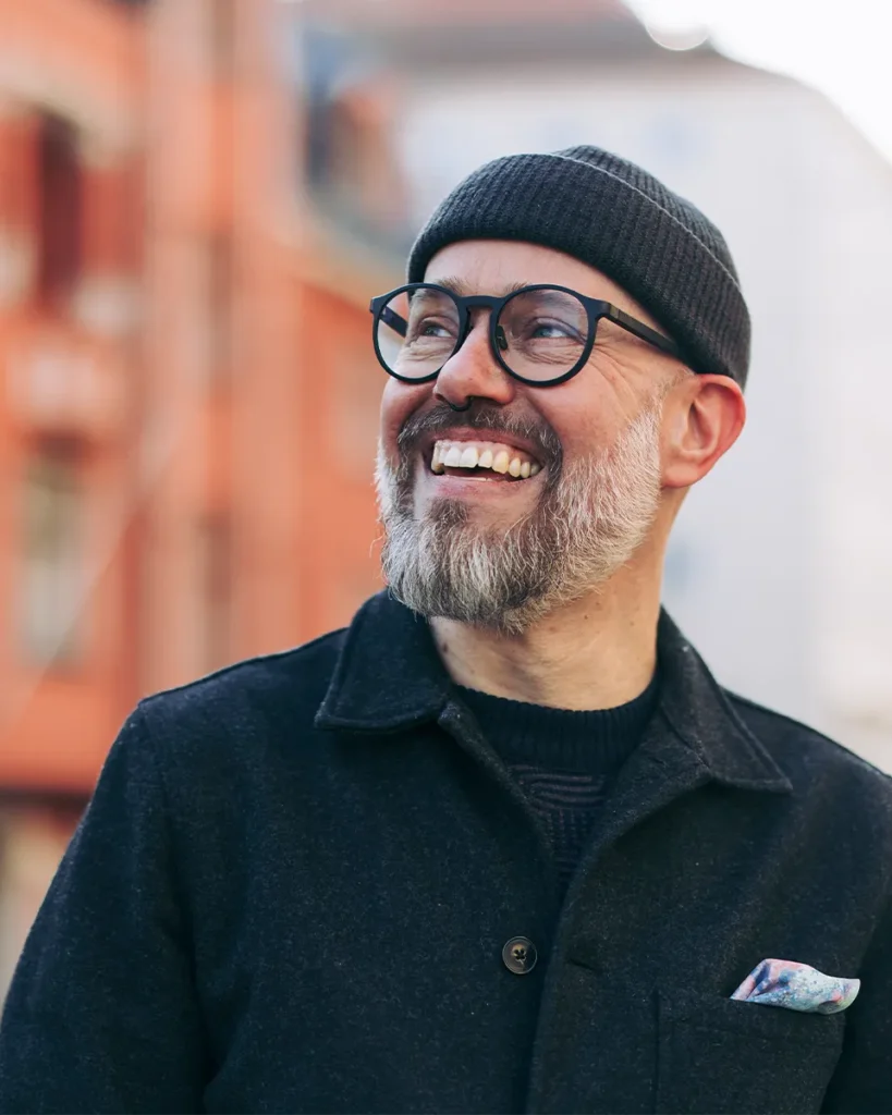 Happy accountant smiling outside