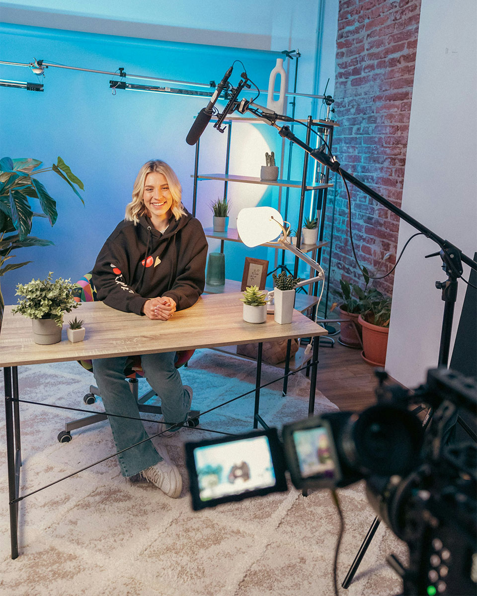 Woman recording a video at her studio
